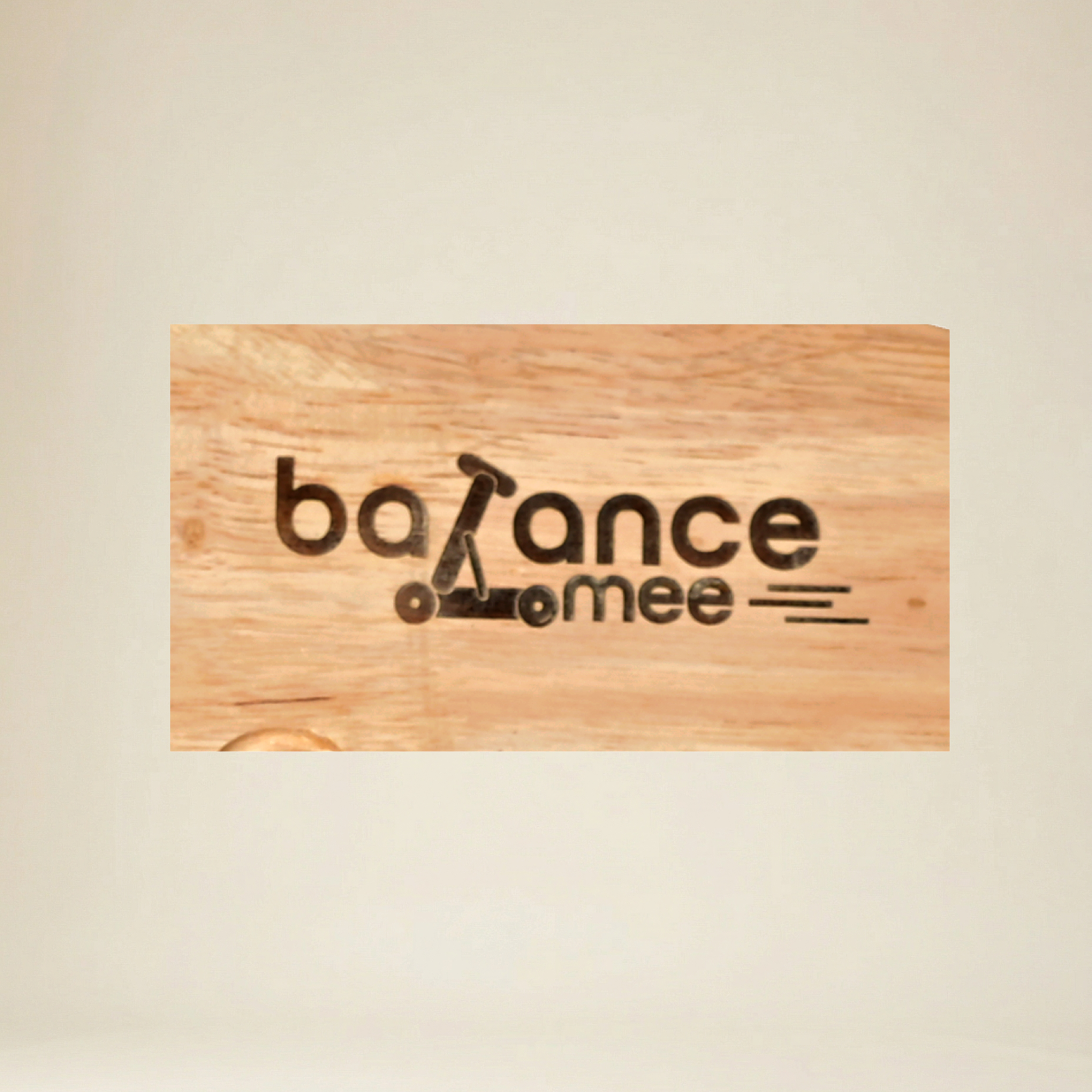 Side view of premium wooden balance board showing smooth curve