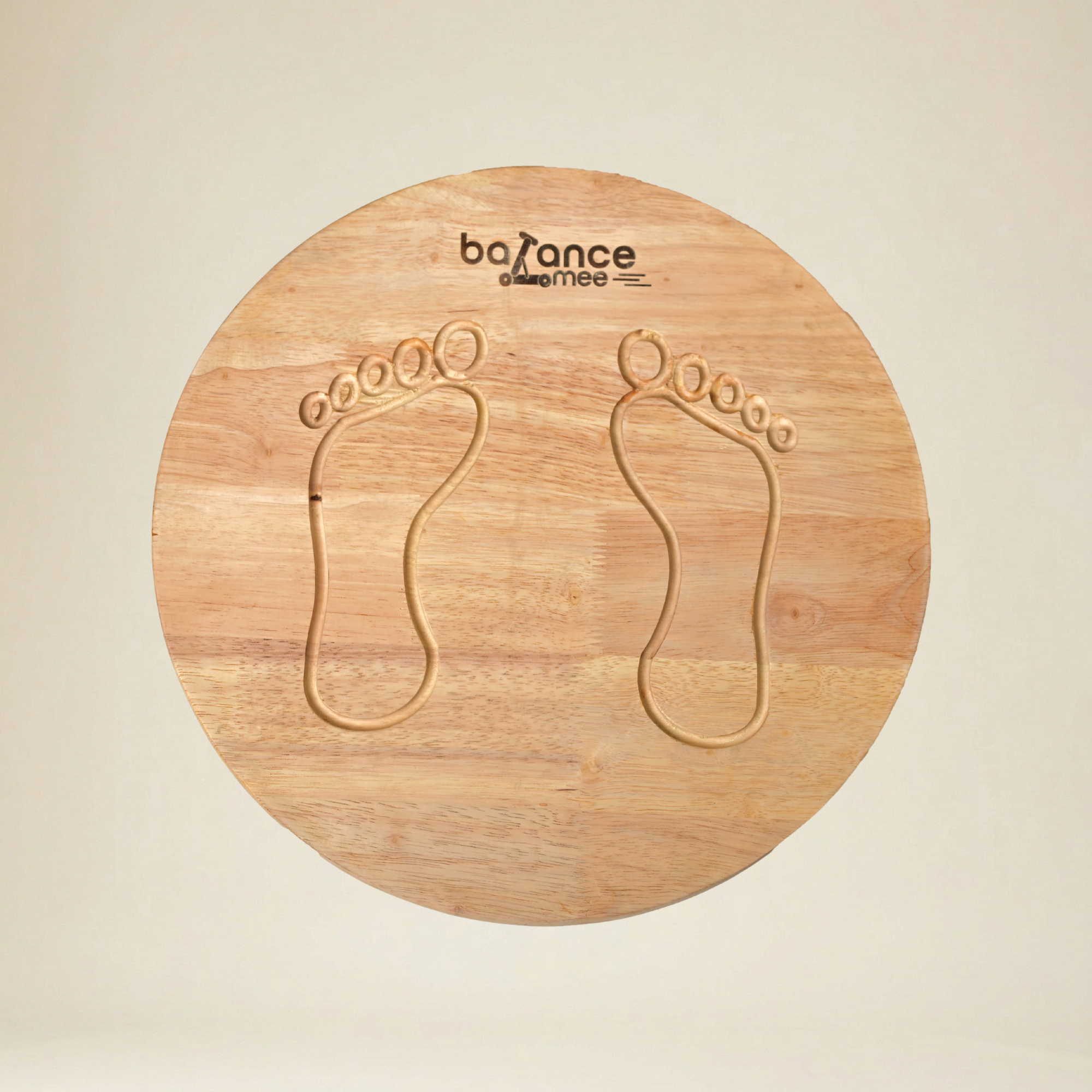 Toddler practicing coordination on a wooden wobble balance board