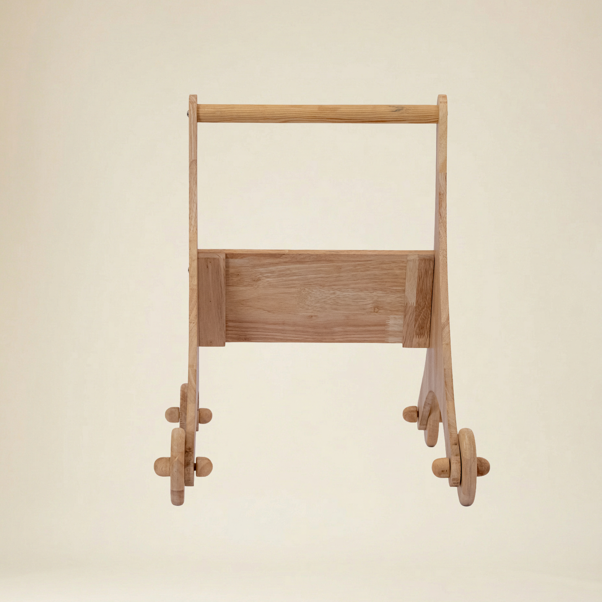 Side view of the star-themed wooden walker showing the sturdy handle
