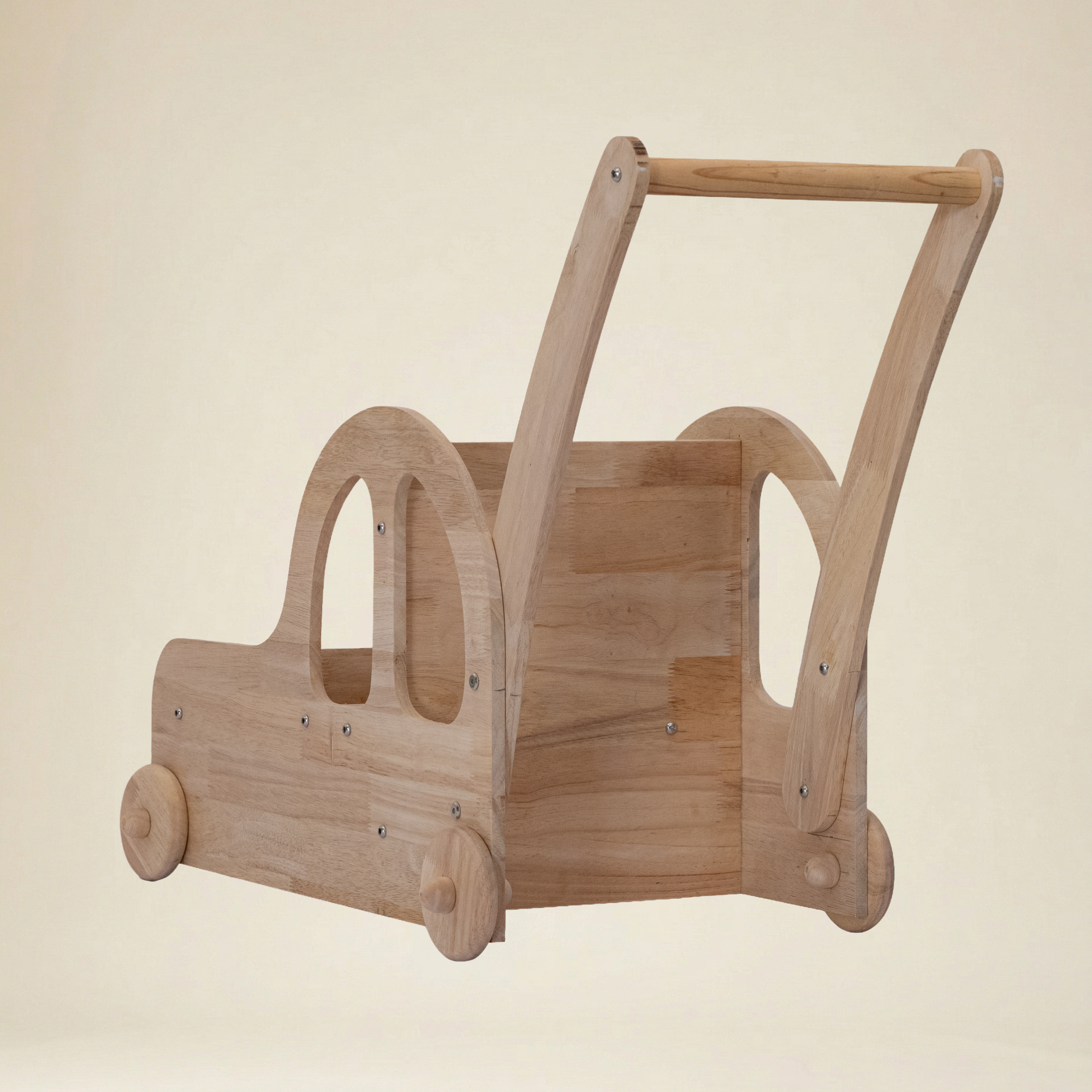 Toddler practicing first steps using a safe wooden car walker