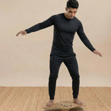 Child practicing coordination on the TASK B wooden balance board