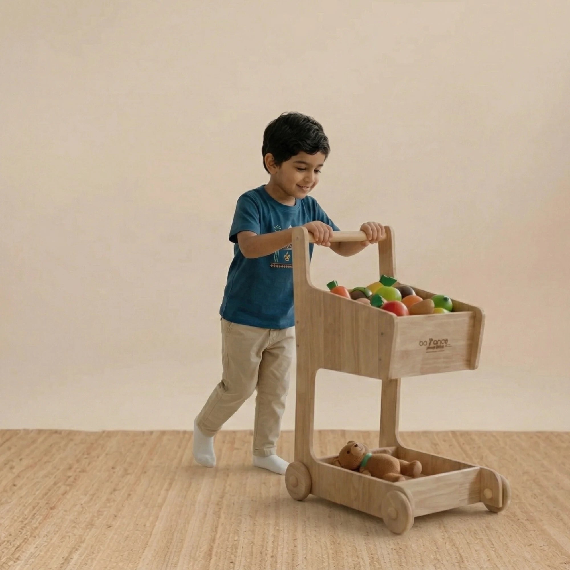 Side view of the wooden shopping cart showing sturdy wheels and handle