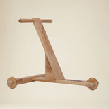 Profile view of Montessori toddler walking aid 